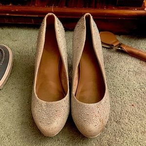 Silver heels with rhinestones on them. Was bought for prom but weren’t used